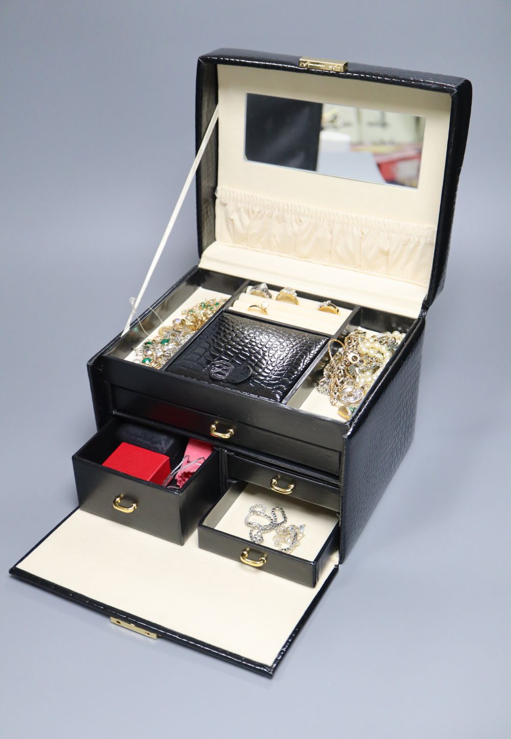 A faux crocodile jewellery box containing a 375 bracelet (11 grams), silver, costume, paste-set and other jewellery, etc.